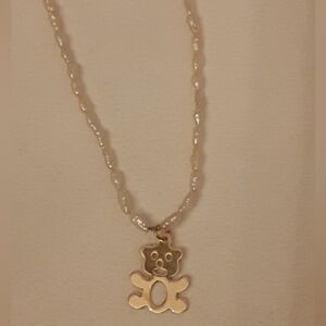 14k Teddybear pendant on a tiny rice pearl necklace with 14k clasp